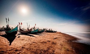 Fishing boats such as these, beached on a strip of coast in Teknaf, Bangladesh, are often used to ferry passengers to larger vessels in the Bay of Bengal bound for Thailand or Malaysia.