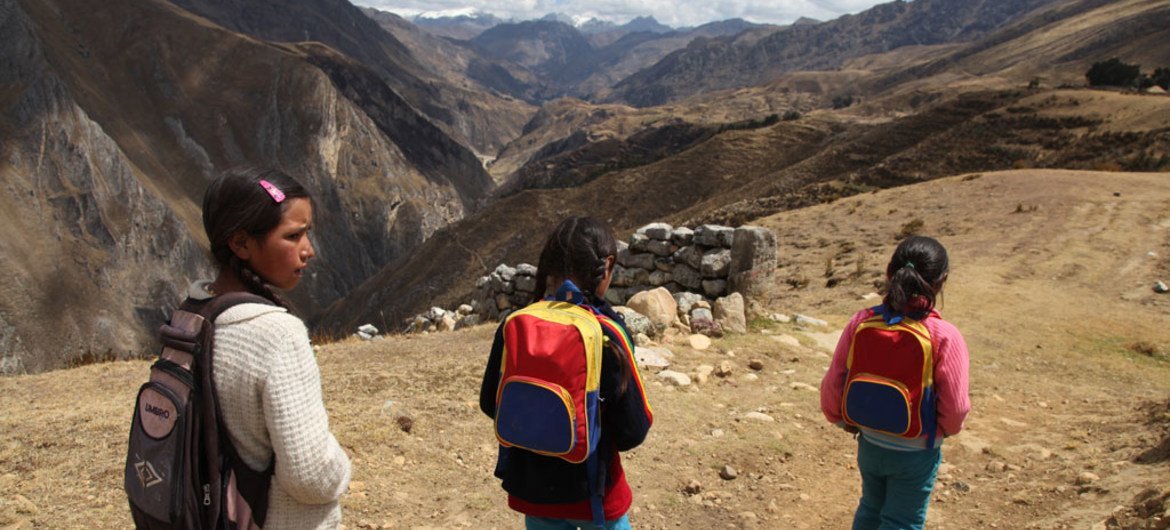 Indigenous children walk home from school in the district of Huallanca, Peru. Classes are taught in Spanish, and students who speak only their native Quechua have difficulty understanding their lessons, resulting in high drop-out rates, says the UN Children’s Fund. UNICEF/NYHQ2011-1606/LeMoyne