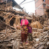 A woman and her child in Khokhana town on the outskirts of Kathmandu, Nepal, after the earthquake destroyed their home.