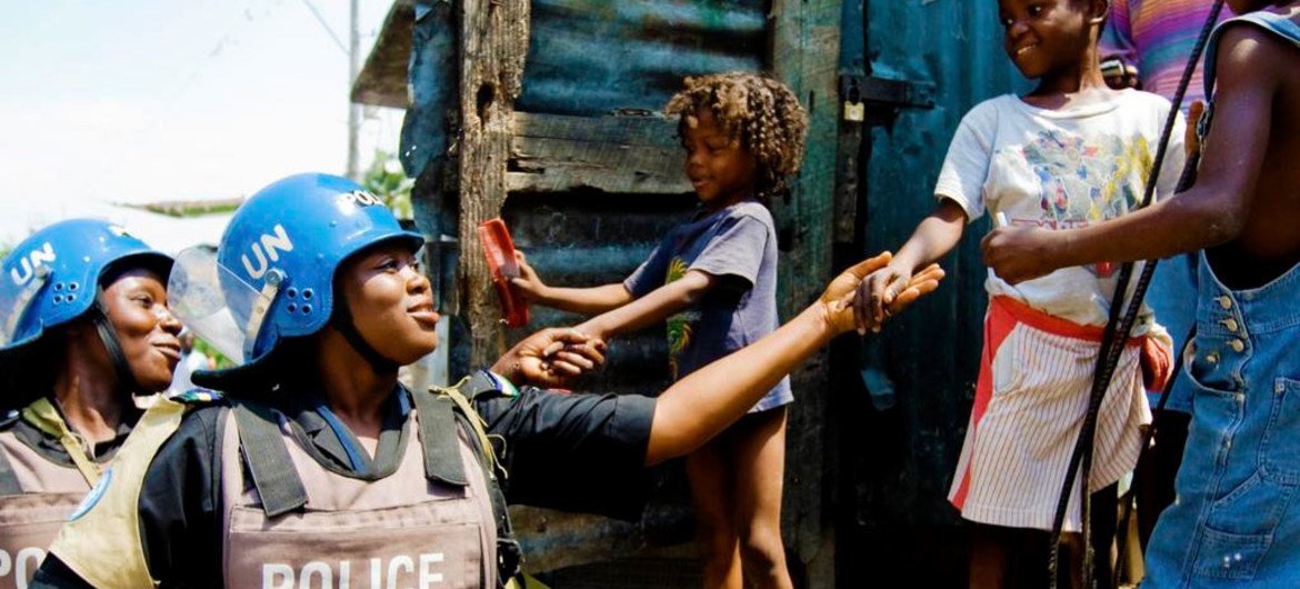 Members of a Formed Police Unit serving with the UN Stabilization Mission in Haiti (MINUSTAH) patrol a neighborhood in the capital, Port-au-Prince (2009).