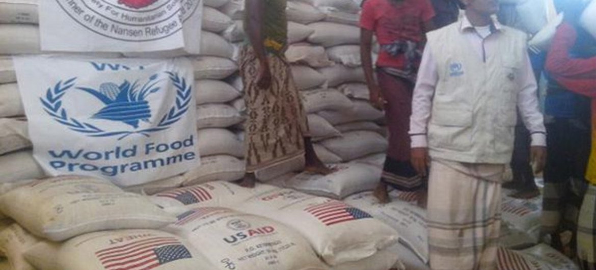 世界粮食计划署向也门民众分发援粮。图片来源：世界粮食计划署