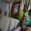 Эта женщина родилась в  Гаити, но все ее восемь  детей появились на свет в Доминиканской Республике. Им, как и десяткам тысяч гаитянцев грозит депортация.  Фото УВКБ