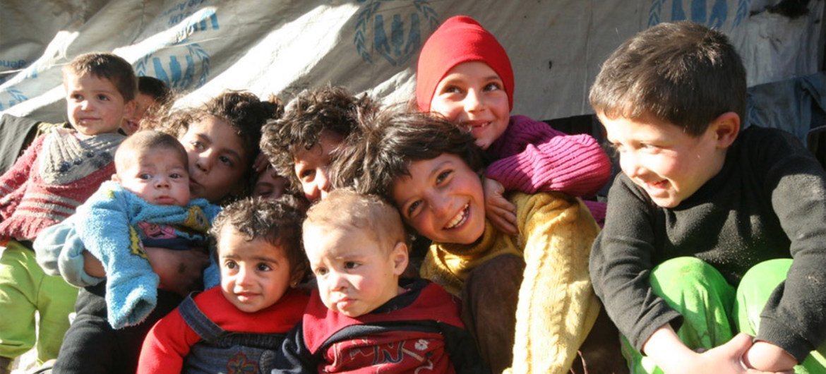Des enfants dans le camp de Tesreen, à Alep, en Syrie. Photo OCHA/Josephine Guerrero