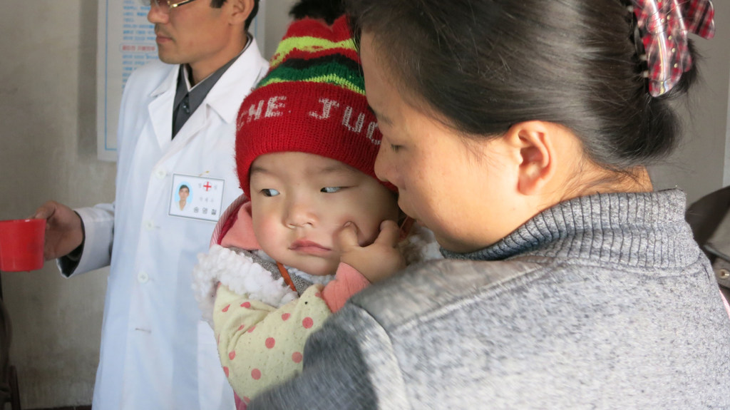 Children wait to receive nutritional supplements at a clinic in Nampo City, Democratic People's Republic of Korea. (file)