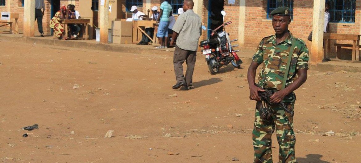 A soldier stands guard outside a  polling station in Burundi’s capital Bujumbura.