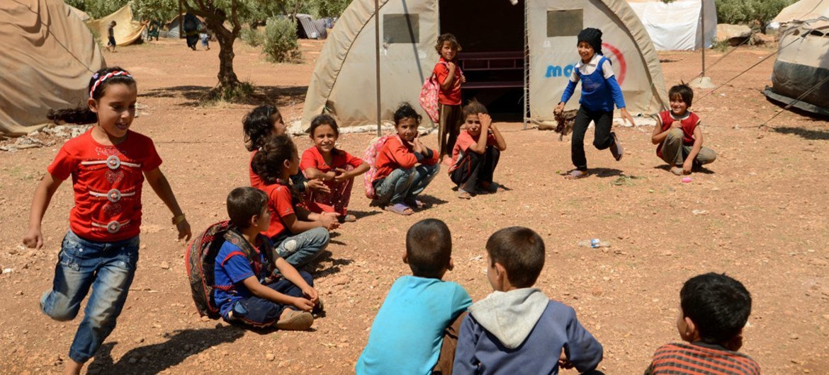 Children play games at Atmeh IDP camp in Idlib province, north Syria.