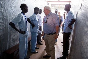 Humanitarian chief Stephen O’Brien (centre) visiting the International Medical Corps clinic, in Juba, South Sudan, where patients from the Protection of Civilians site are treated for many conditions, including cholera.