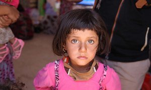 A Yazidi girl poses for the camera. The Yazidis are an ethnic minority in Iraq and among some of the most vulnerable of the eight million people who’ve been affected by conflict.