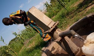 Fetching water at a borehole in the village of Bilinyang, near Juba, South Sudan.