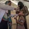 Кампания иммунизации   против полиомиелита. Фото Управления  ООН  по координации  гуманитарных вопросов