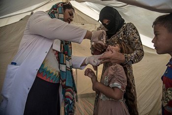 Кампания иммунизации   против полиомиелита. Фото Управления  ООН  по координации  гуманитарных вопросов