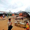 世界粮食计划署向缅甸受灾民众提供援粮。粮食署图片