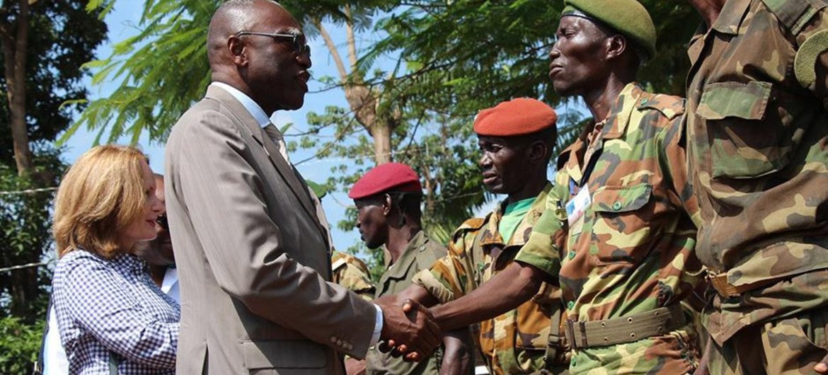 Special Representative and head of the UN peacekeeping mission, known as MINUSCA Babacar Gaye (left) encourages ex-combatants to join the road to peace in the Central African Republic (CAR).