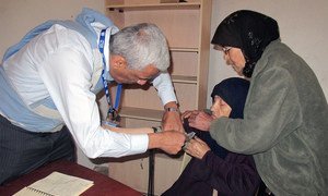 UNRWA medical personnel providing vital healthcare to civilians at a mobile health point in Yalda, Syria. (file photo)