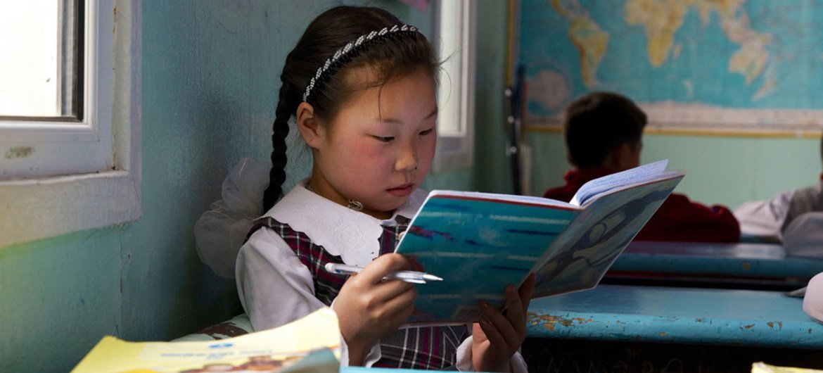 A young girl studies during class break. With rapid growth, the Government of Mongolia introduced a number of programs to improve the country’s education system, especially rural primary education.