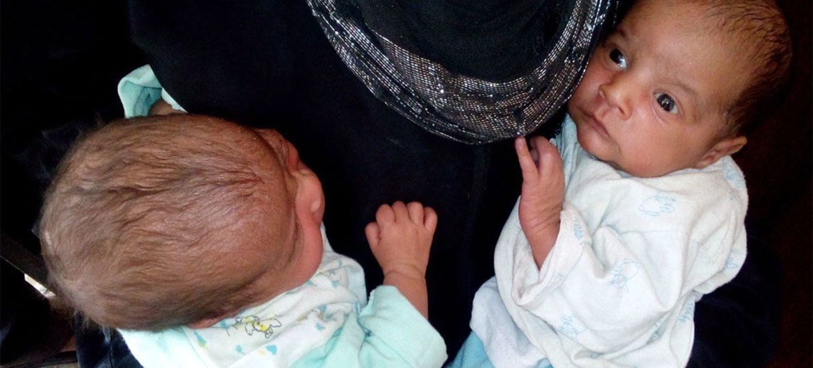 Two infants at the UNRWA medical point in Yalda, set up to provide vital healthcare to civilians displaced from Yarmouk and host communities.