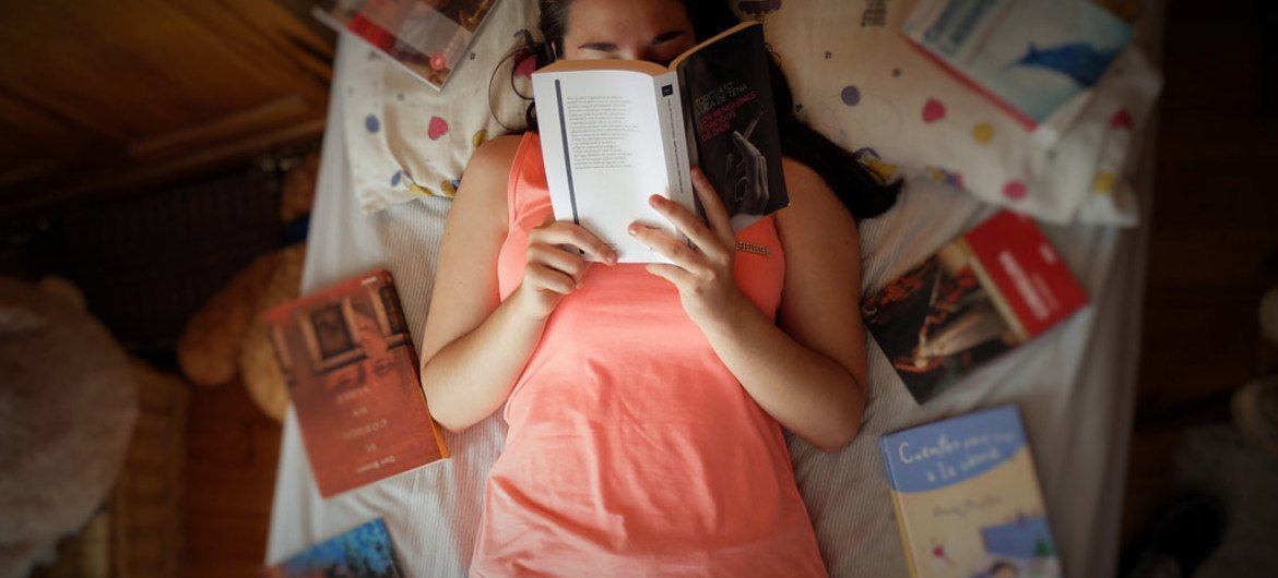 This 17-year-old from Spain, shown here reading, is a survivor of sexual abuse. 