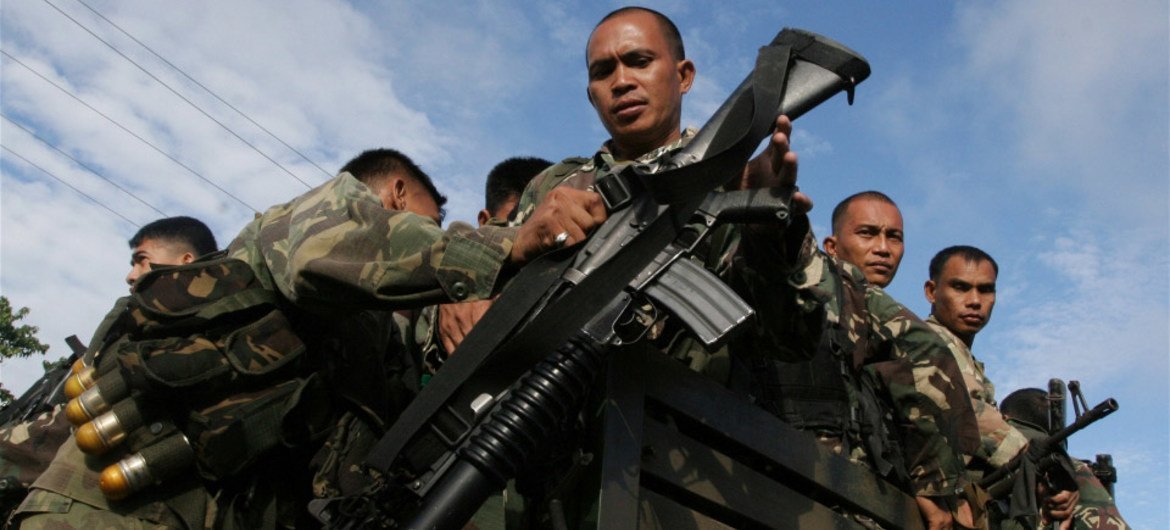 Philippine army troops on combat patrol in Maguindanao Province, Mindanao.