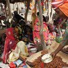 A woman buys dates at the market in the town of Bol on the outskirts of Lake Chad.