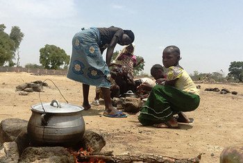 Girls in northern Nigeria prepare a meal. The crisis caused by the Boko Haram insurgency threatens to undermine development throughout the region.