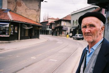 An elderly man waits for the tram in Sarajevo, Bosnia and Herzegovina.