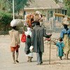 1994年7月逃离灭绝种族行为的卢旺达难民。联合国图片/John Isaac