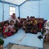 Иракская семья в лагере для внутренне перемещенных лиц. Фото: УКГВ / Шарлотта Канс