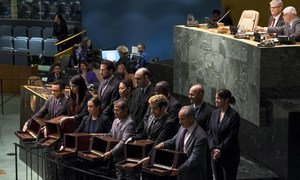 Conference officers hold up empty ballot boxes for inspection prior to the vote to elect five non-permanent members of the Security Council.