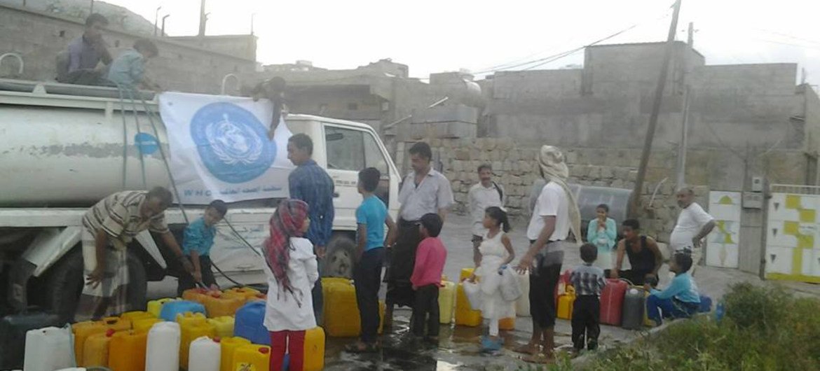 The World Health Organization (WHO) delivering water to residents of Taiz City, Yemen, where water scarcity is a major problem.