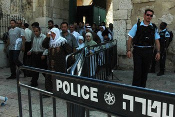 On the Temple Mount in the Old City of Jerusalem, Israel, Muslims leave the  Dome of the Rock after Friday prayers. Police presence is always tight and young males are not allowed or have their ID’s seized going in.