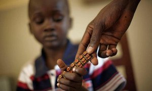 A child receiving Tuberculosis medicine in South Sudan under a programme supported by the Global Fund to Fight AIDS, Tuberculosis and Malaria and UNDP.