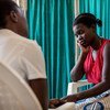 Malawi teen, Martha, was born with HIV. Now a mother herself, she has defied the odds and her son, Rahim Idriss, is part of Malawis AIDS-free generation. In this picture, she awaits the results of Rahmins HIV test. After two months of waiting, she finds o
