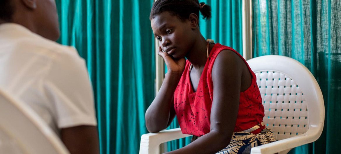 Malawi teen, Martha, was born with HIV. Now a mother herself, she has defied the odds and her son, Rahim Idriss, is part of Malawis AIDS-free generation. In this picture, she awaits the results of Rahmins HIV test. After two months of waiting, she finds o