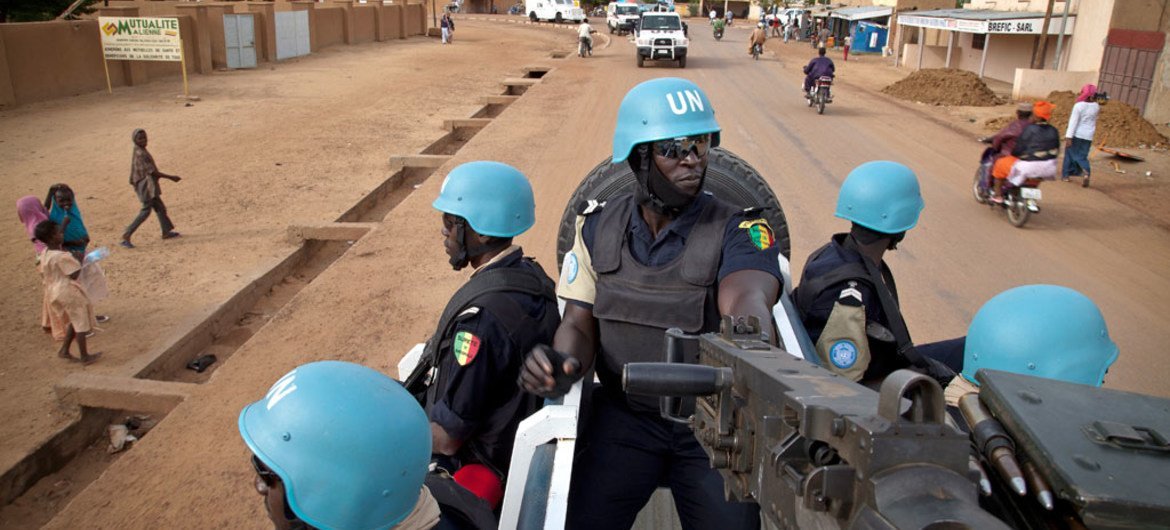 Senegalese police officers serving with the UN Multidimensional Integrated Stabilization Mission in Mali (MINUSMA), patrol the streets of the city of Gao, in Mali.