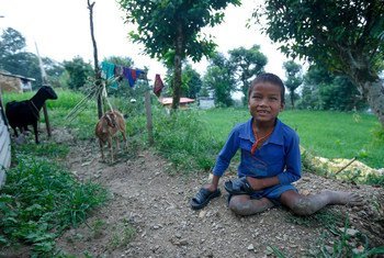 Ten year old Babu Kaji Tamang, who gets around by crawling on all fours, at his home  in Sindhupalchwok, Nepal, one of the most earthquake-affected districts.