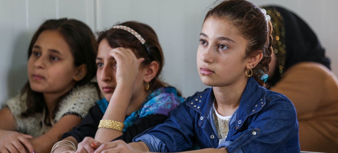 Children attend school at Harsham Camp for internally displaced people in Erbil, Iraq.
