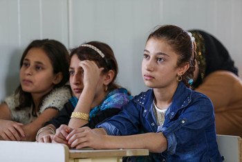Children attend school at Harsham Camp for internally displaced people in Erbil, Iraq.