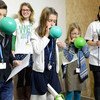 At the opening event for ‘Young and Future Generations Day’ at the UN climate change conference (COP21), young climate advocates blow up balloons, representing the earth. 3 December 2015.