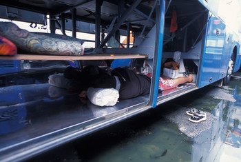 Estación de autobuses Mo Chit en Bangkok, Tailandia, un centro activo de traficantes de personas. Foto: UNICEF / Jim Holmes
