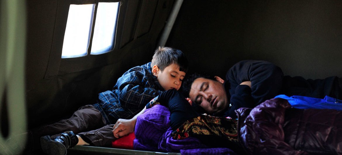 In Croatia, a refugee family rests in the UNICEF-supported Family Area at the reception centre in Opatovac.