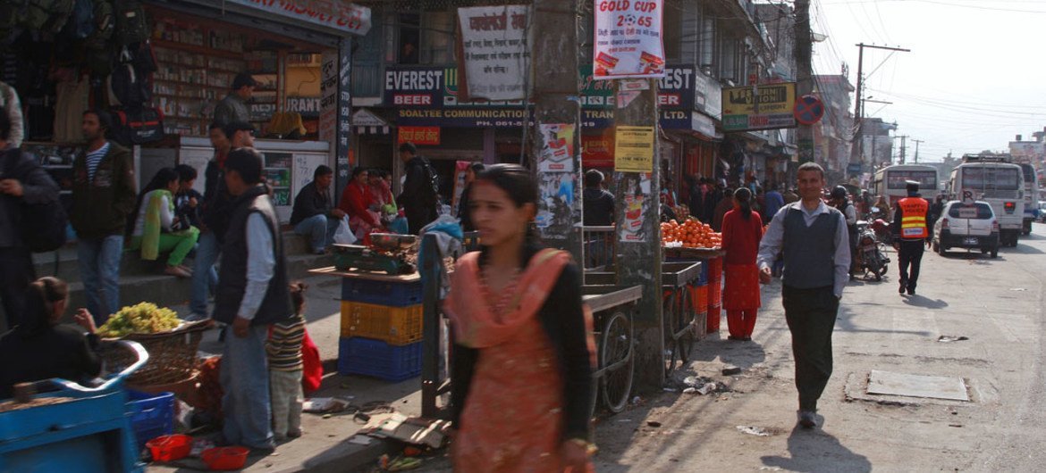 Pedestrians, storefronts and vendors, Nepal.