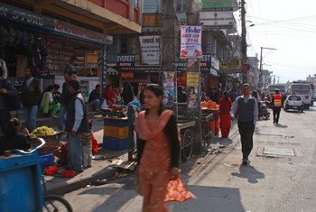 Pedestrians, storefronts and vendors, Nepal.