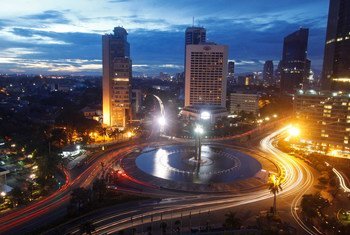 City and traffic lights at sunset in Jakarta, Indonesia.