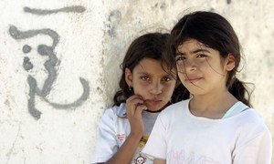 Two young residents from the United Nations Relief and Works Agency (UNRWA) Acqba Jaber camp for Palestinian refugees in the West Bank. The camp is located just outside of Jericho.