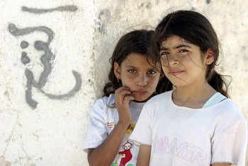Two young residents from the United Nations Relief and Works Agency (UNRWA) Acqba Jaber camp for Palestinian refugees in the West Bank. The camp is located just outside of Jericho.