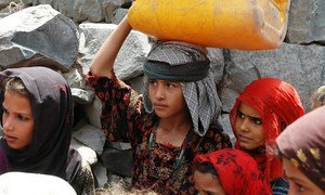 Girls fetching water in Mawyah district, Taiz. This role often falls on the shoulders of girls and young women, often at the expense of their education.