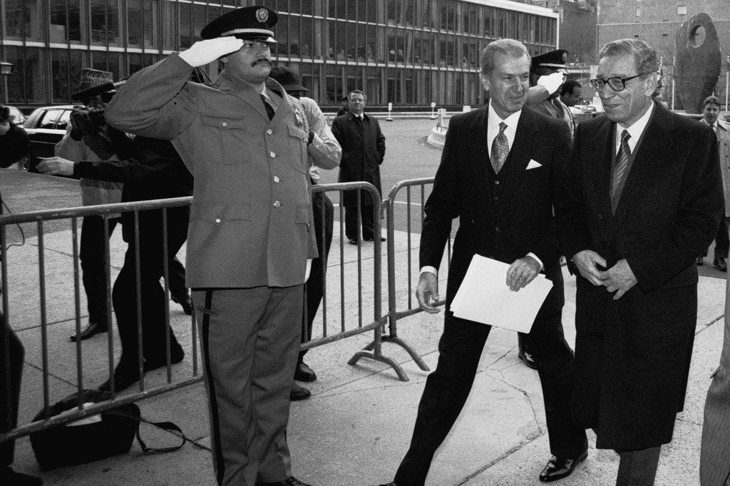 On 2 January 1992, Boutros Boutros-Ghali (right), Secretary-General of the United Nations, arrives at UN Headquarters for his first working day at the United Nations. Aly Teymour, Chief of Protocol, escorts him into the building.