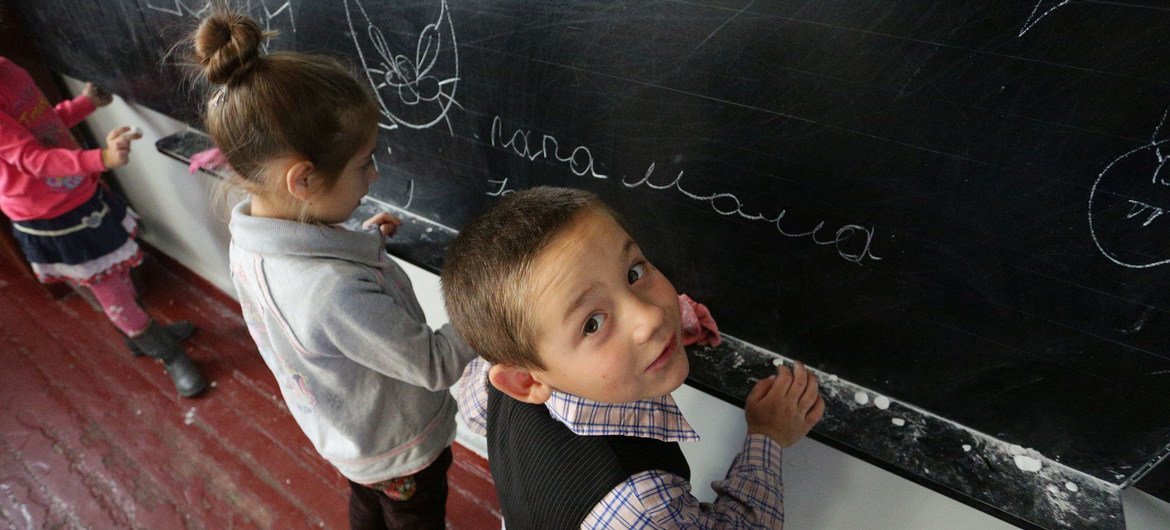 Children in a school in the village of Staromykhailovka, on the front line between the cities of Donetsk and Mariyanovka, Ukraine.
