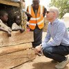 UN Assistant High Commissioner for Protection Volker Türk talks to displaced Nigerian children in Malkohi host community, Yola, Nigeria.