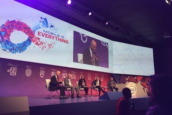 UN Special Adviser David Nabarro (on screen) promoted the Sustainable Development Goals at the World Mobile Summit in Barcelona.